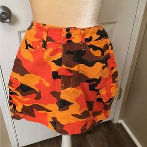 Orange camouflage preowned skirt.  Size M